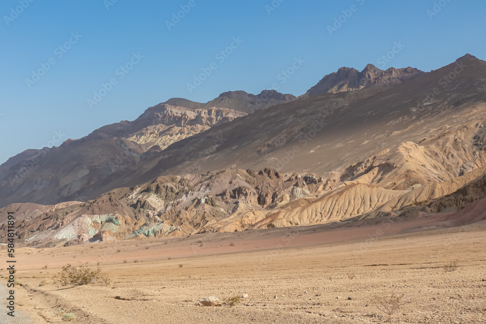 Scenic view of colorful geology of multi hued Amargosa Chaos rock formations in Death Valley National Park, Furnace Creek, California, USA. Barren desert landscape of Artist Palette in Black mountains Scenic view of colorful geology of multi hued Amargosa Chaos rock formations in Death Valley National Park, Furnace Creek, California, USA. Barren desert landscape of Artist Palette in Black mountains