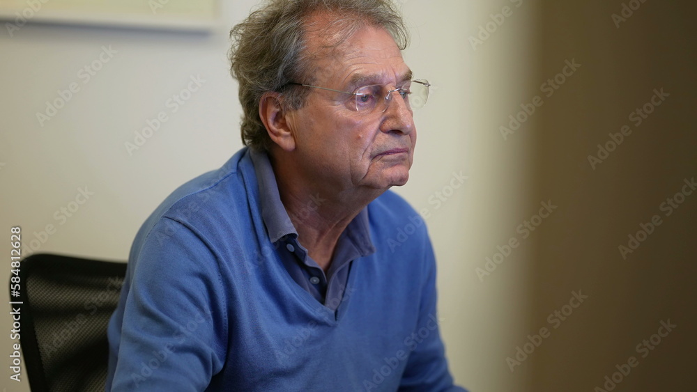 Fototapeta premium One senior business man working in front of computer screen. Older mature entrepreneur reading content online