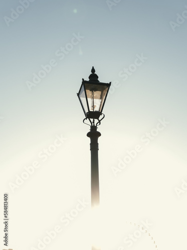 Lamppost in the fog  photo