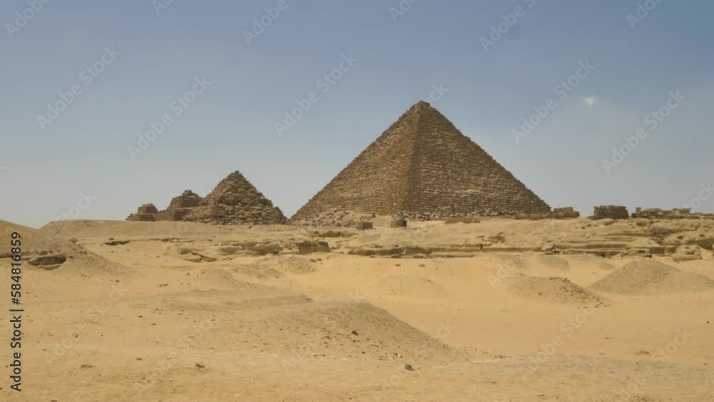 2022 - The pyramids of Giza sit among sand dunes. 2022 - The pyramids of Giza sit among sand dunes.