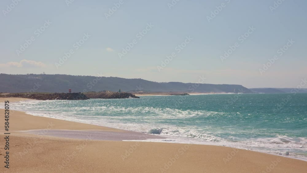 Blue sea and clear fine sand on the beach on a sunny day Blue sea and clear fine sand on the beach on a sunny day
