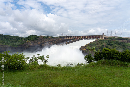  Itaipu Dam spillway viewed from visitors center near Foz do iguacu, brazil. Itaipu Dam is a hydroelectric dam on the border between Brazil and Paraguay.