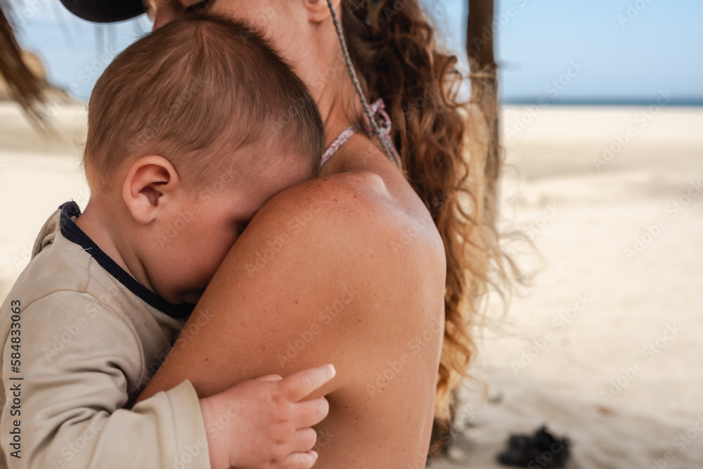 mother and baby hugging mother and baby hugging