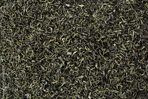 Background of chinese green tea, close up. Green Tea use for weight loss, caffeine alternative and improving heart health.