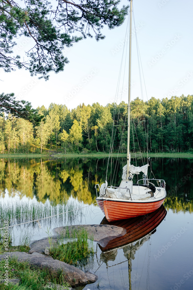 Sailboat on calm lake Sailboat on calm lake