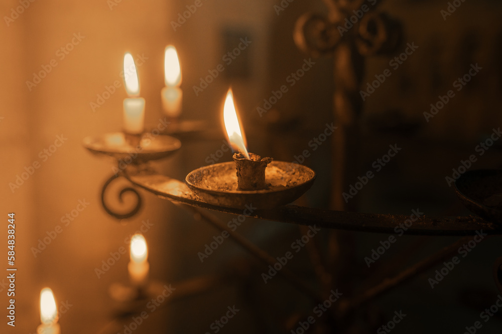 Candle light church candle sticks candlelight flame burning prayer wax wick  cathedral temple place of worship holy light Stock Photo