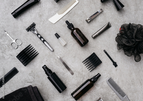Set of various grooming and shaving tools on table