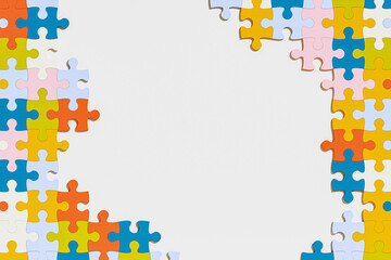 Blank space center and colorful jigsaw puzzle pieces form the frame