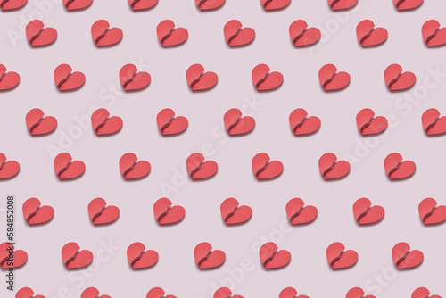 Pattern of repeated torn red paper hearts.
