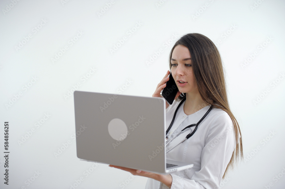 Portrait of happy american mid adult woman with stethoscope and hands in pockets, copy space. white background, confidence, doctor, medical, healthcare, hospital and medical occupation. High quality Portrait of happy american mid adult woman with stethoscope and hands in pockets, copy space. white background, confidence, doctor, medical, healthcare, hospital and medical occupation. High quality