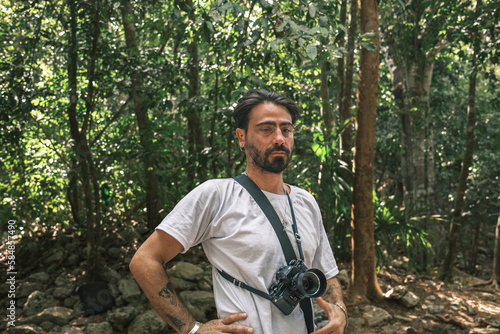 portrait of a photographer in the jungle photo