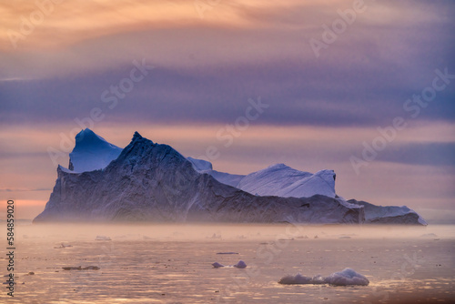 Midnight Sun And Haze On Floating Icebergs   photo