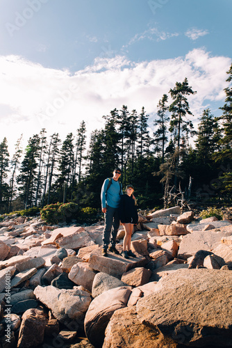 Father and daughter on rocks photo