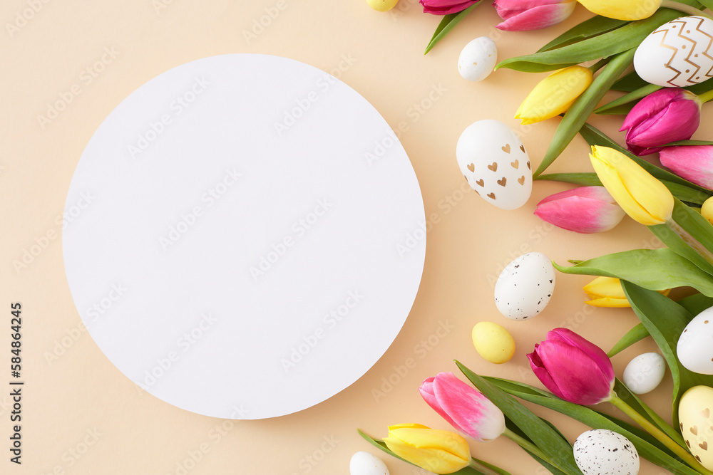 Easter mockup concept. Top view photo of white circle colorful easter eggs yellow pink tulips flowers on isolated beige background with blank space Easter mockup concept. Top view photo of white circle colorful easter eggs yellow pink tulips flowers on isolated beige background with blank space