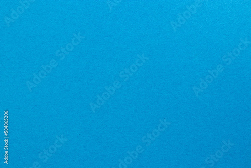 Deep sky blue colored tinted paper texture swatch.