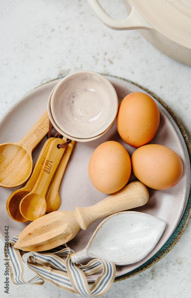 Tableware and cookware on the kitchen counter Tableware and cookware on the kitchen counter