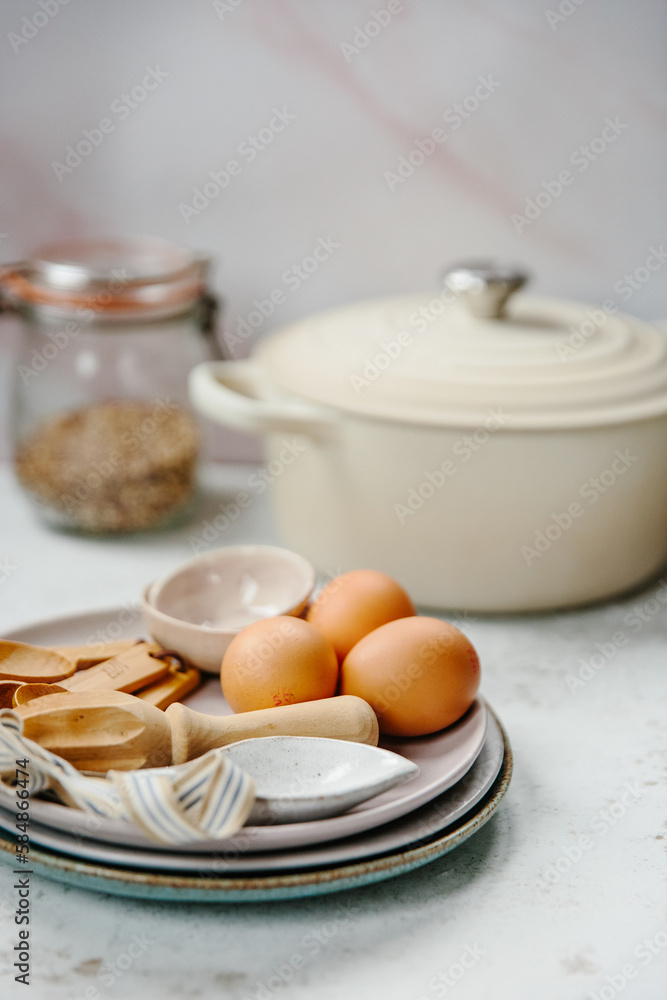 Tableware and cookware on the kitchen counter Tableware and cookware on the kitchen counter