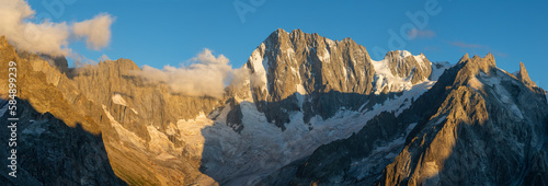 The panorama of Grand Jorasses massif in the sunset light. photo