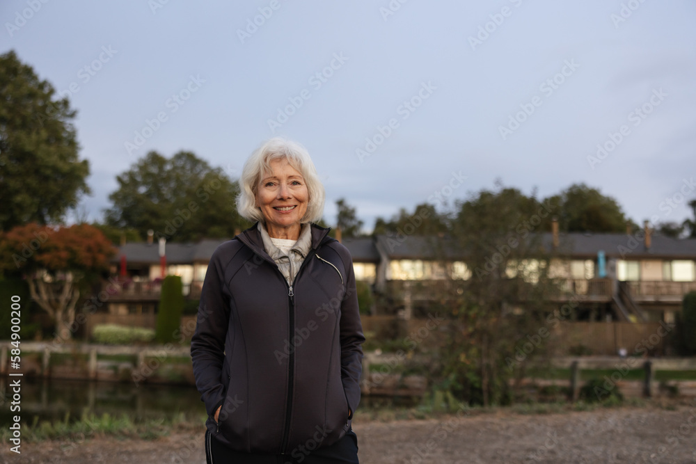 Smiling portrait of active woman outside. Smiling portrait of active woman outside.