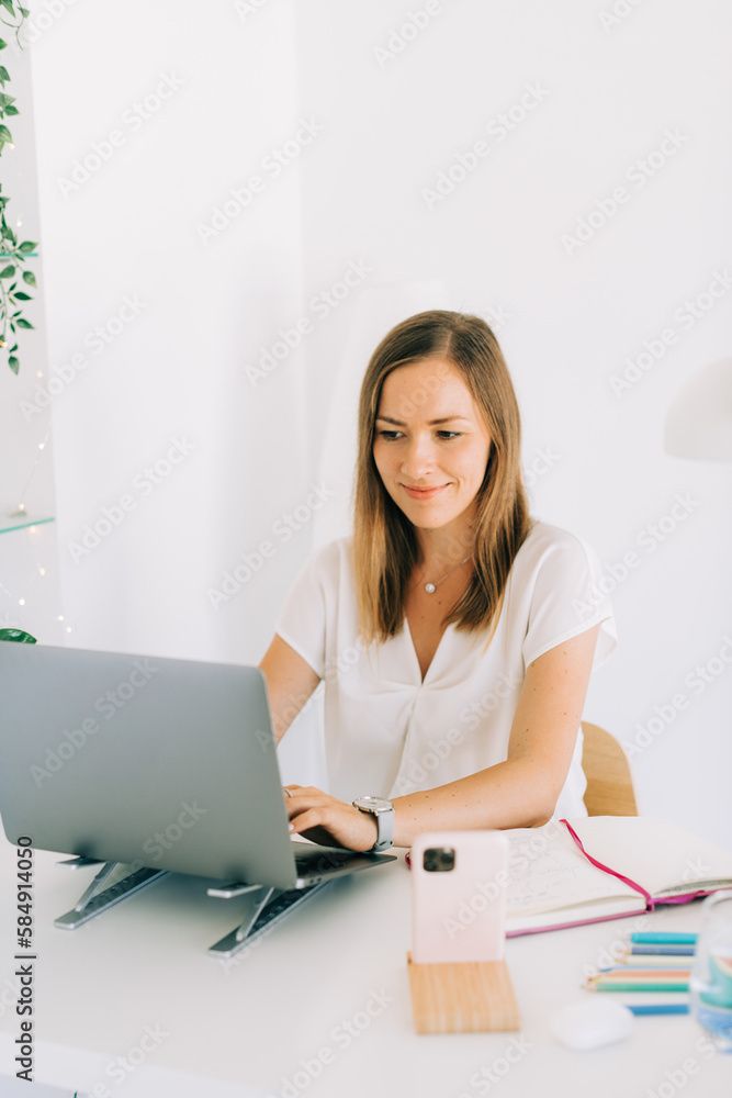 Woman working on computer Woman working on computer