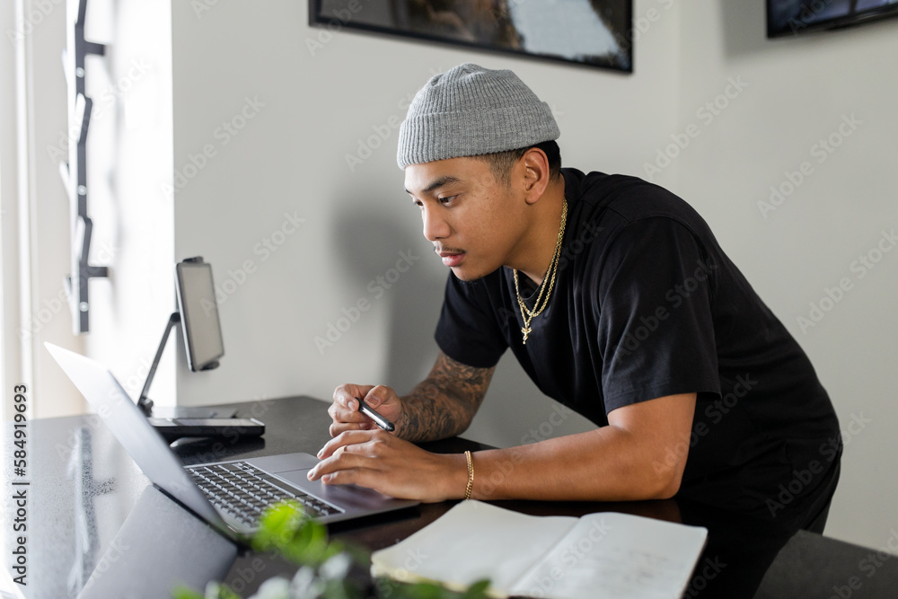 Young Business Owner On Laptop Young Business Owner On Laptop