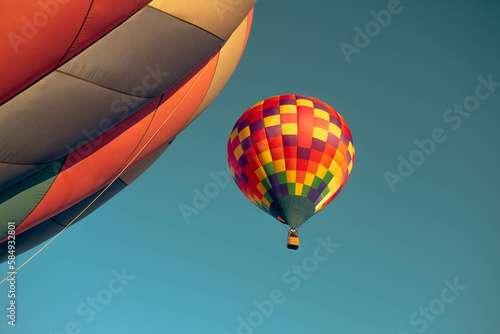 Hot Air Balloon Among Bright Blue Sky photo