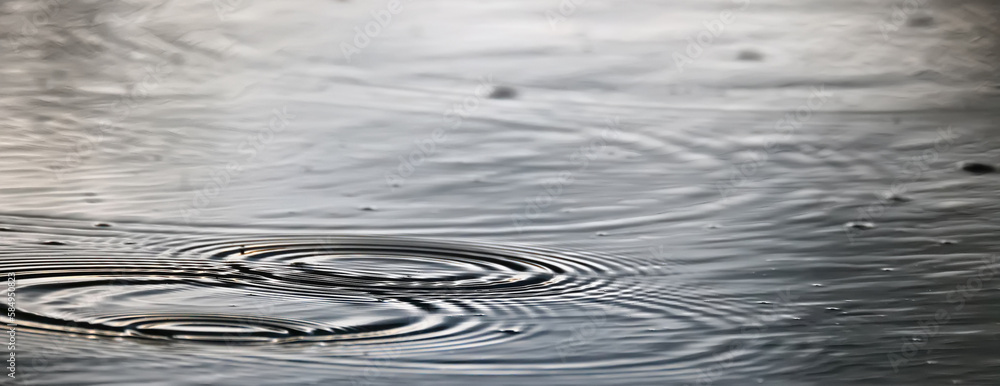 raindrops on water background abstract circles rain ripples
