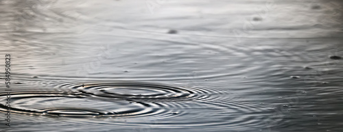 raindrops on water background abstract circles rain ripples