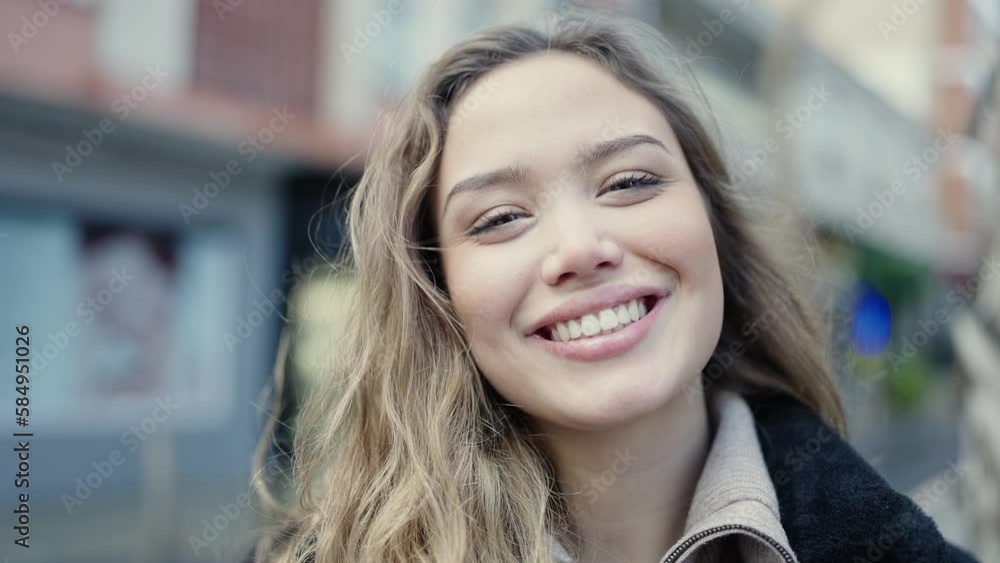 Young beautiful hispanic woman smiling confident standing at street Young beautiful hispanic woman smiling confident standing at street