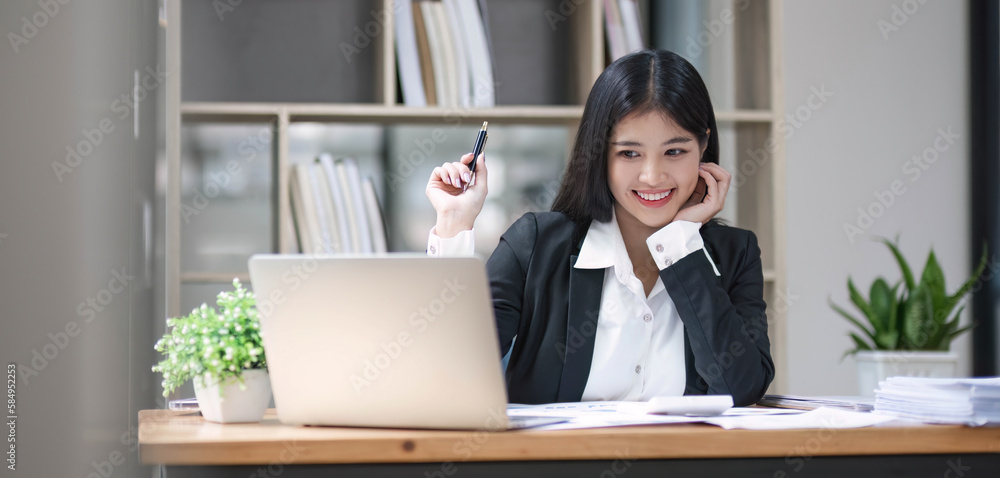 Business woman using calculator for do math finance on wooden desk in office and business working background, tax, accounting, statistics and analytic research concept. Business woman using calculator for do math finance on wooden desk in office and business working background, tax, accounting, statistics and analytic research concept.