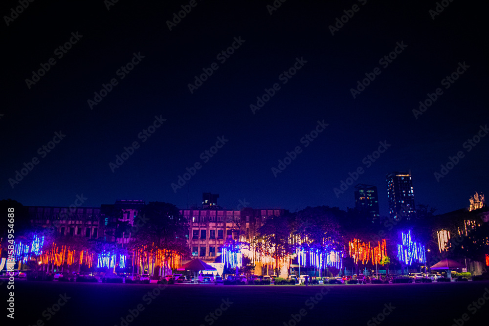Fototapeta premium Christmas lights in the city streets. University of Santo Tomas, Manila, Philippines
