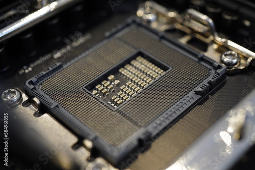 Closeup of an Intel LGA1700 CPU socket on an Asus TUF Gaming Z790-Plus Wifi motherboard without CPU installed