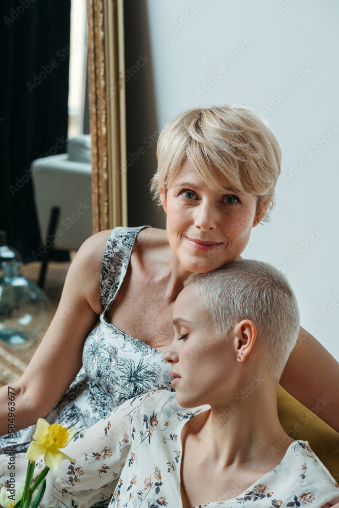 © Irina Polonina/Stocksy - Portrait of family female. © Irina Polonina/Stocksy - Portrait of family female.