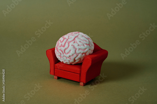 fake brain on an armchair