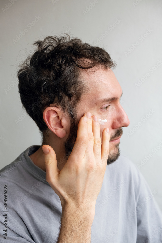 Close portrait of a man with cosmetics Close portrait of a man with cosmetics