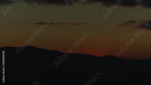 Sunset Timelapse With Mountains and Buildings At Alphaville São Paulo Brazil photo