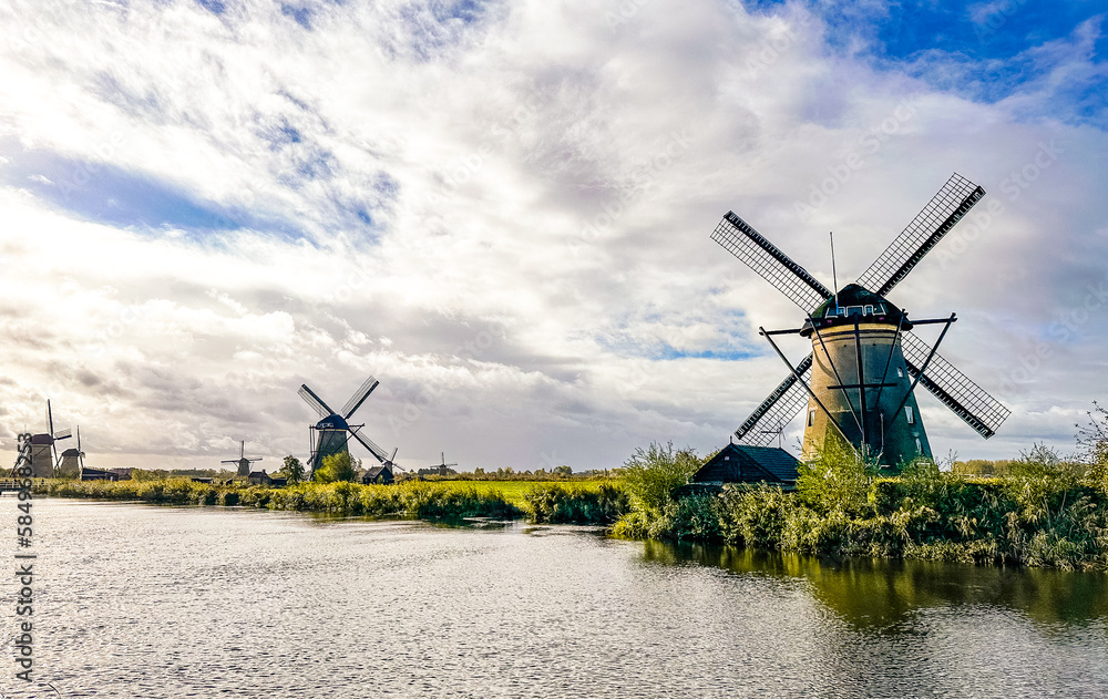 Fototapeta premium Kinderdijk windmills and water canal in Netherlands, Europe
