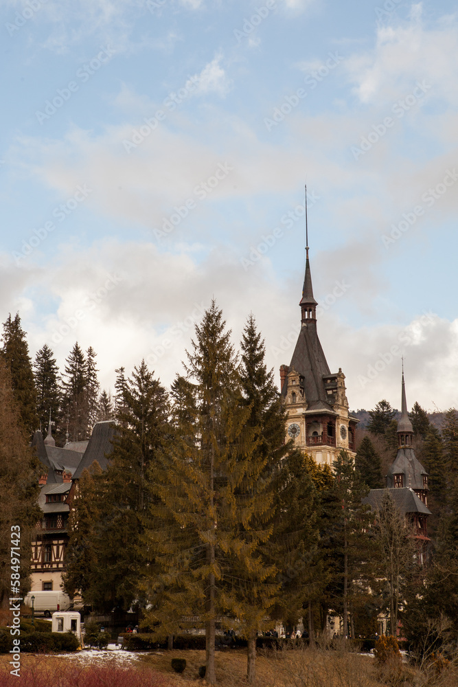 Side view of Peles Castle from Sinaia, Romania. Medieval castle
