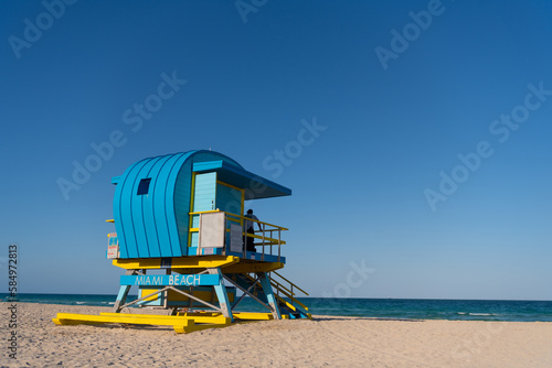 summer beach with lifeguard tower, copy space. summer beach with lifeguard station