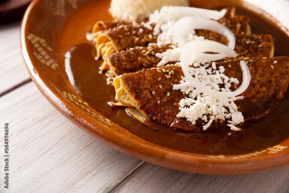 Chicken enmoladas. Also known as mole poblano enchiladas, they are a