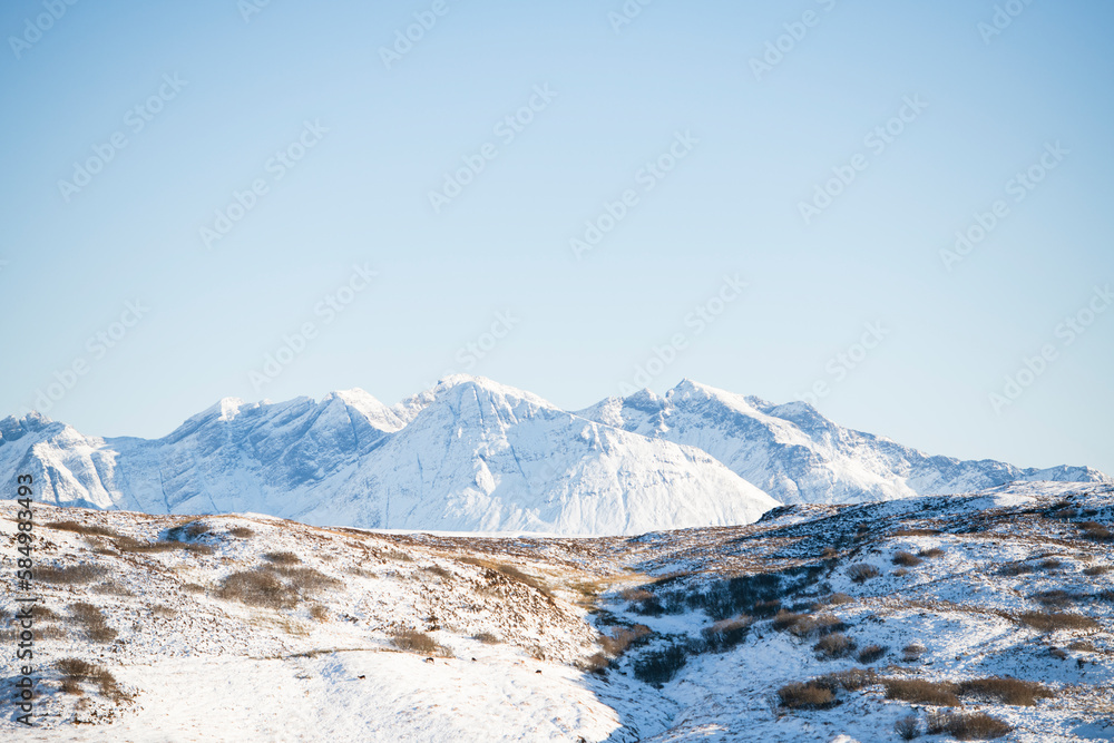 Snowy mountain ridge on Isle of Skye in Scottish Highlands