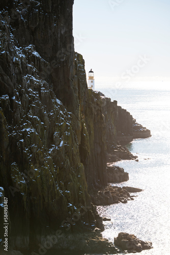 Neist Point Lighthouse on the Isle of Skye coast of Scotland photo