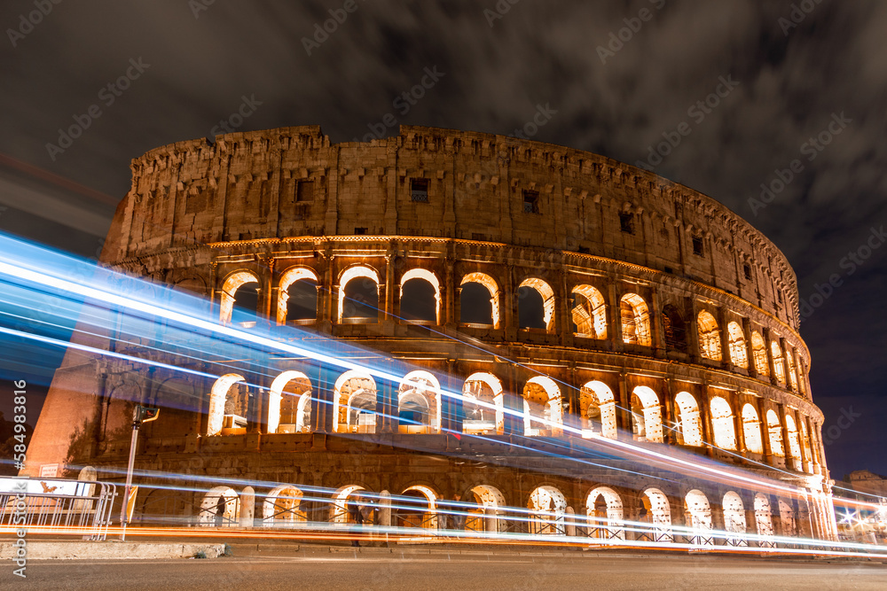 Roman Colosseum at night with flashes of light