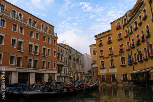 Canal with gondola and buildings in Venice, Italy