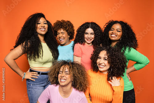 Portrait of young women with diverse afro hairstyles photo