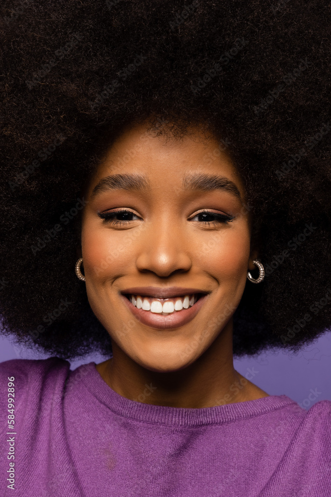 Cheerful black positive woman with curly hair Cheerful black positive woman with curly hair