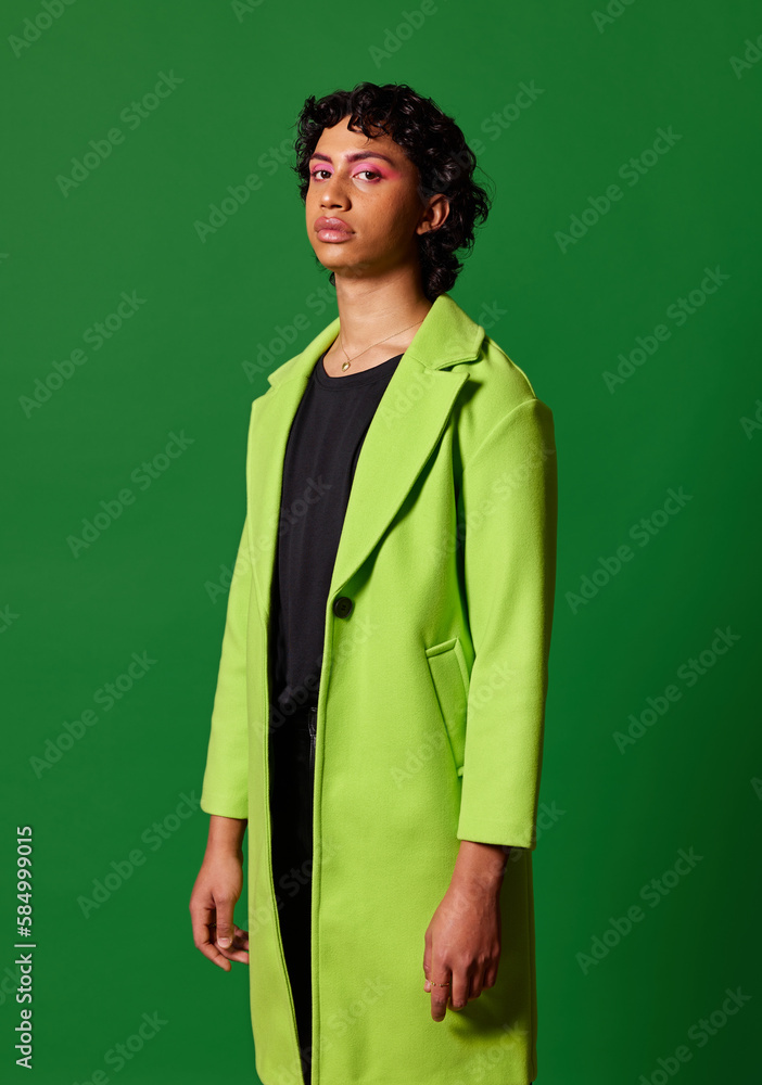 Stylish man with makeup in studio Stylish man with makeup in studio