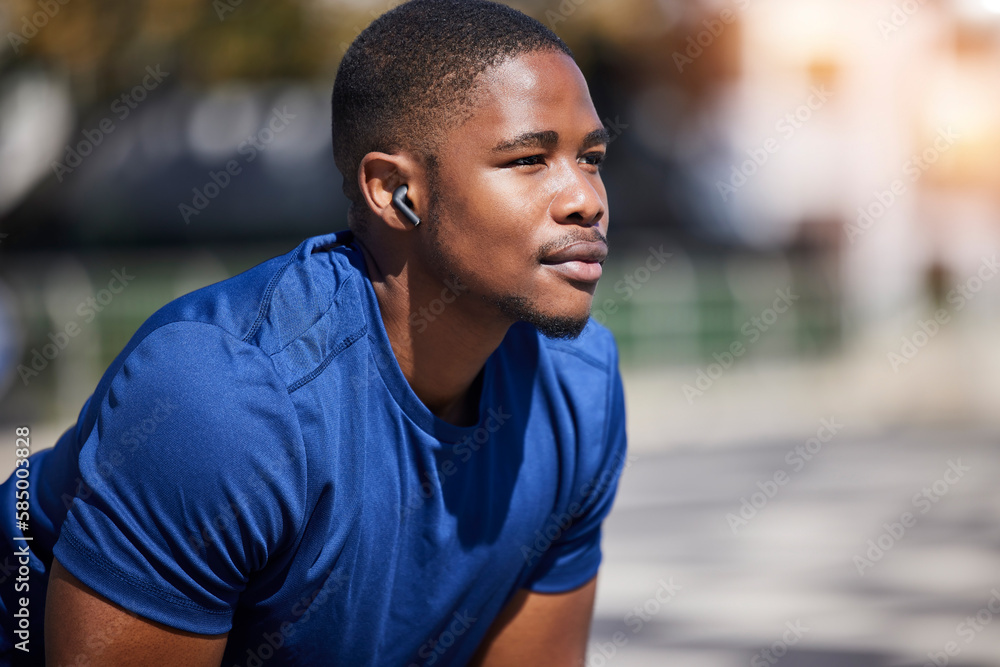 Fitness, break and man runner relax with music before training, running or morning cardio outdoors. Sports, pause and male athlete breathing, mindset and preparation for marathon practice workout run