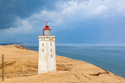 Seascape view at Rubjerg knude lighthouse at sand dunes
