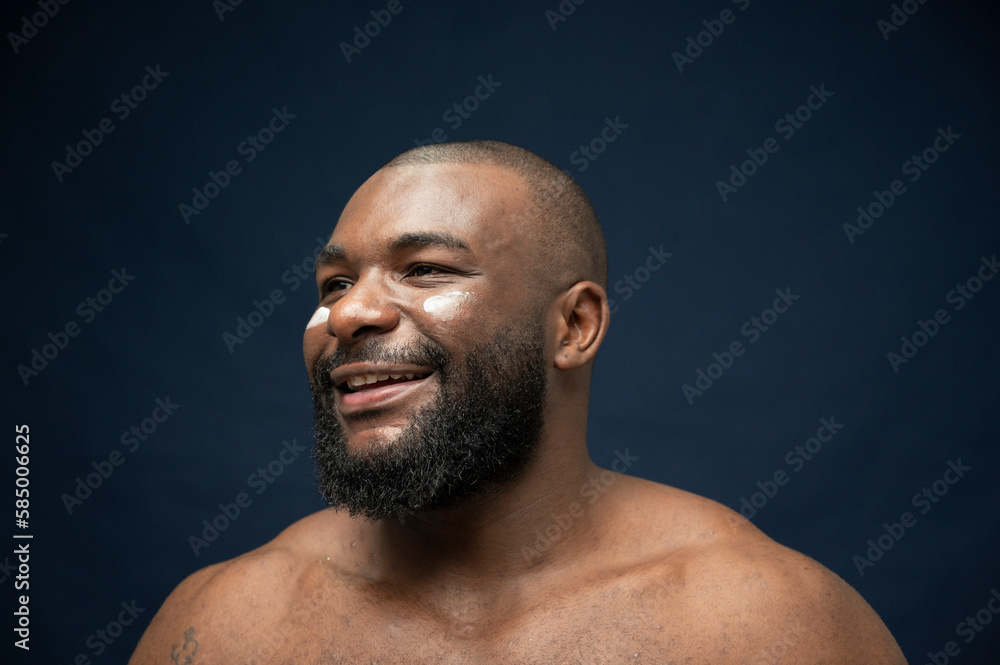 Male African Bearded Model With Skin care smiling Male African Bearded Model With Skin care smiling